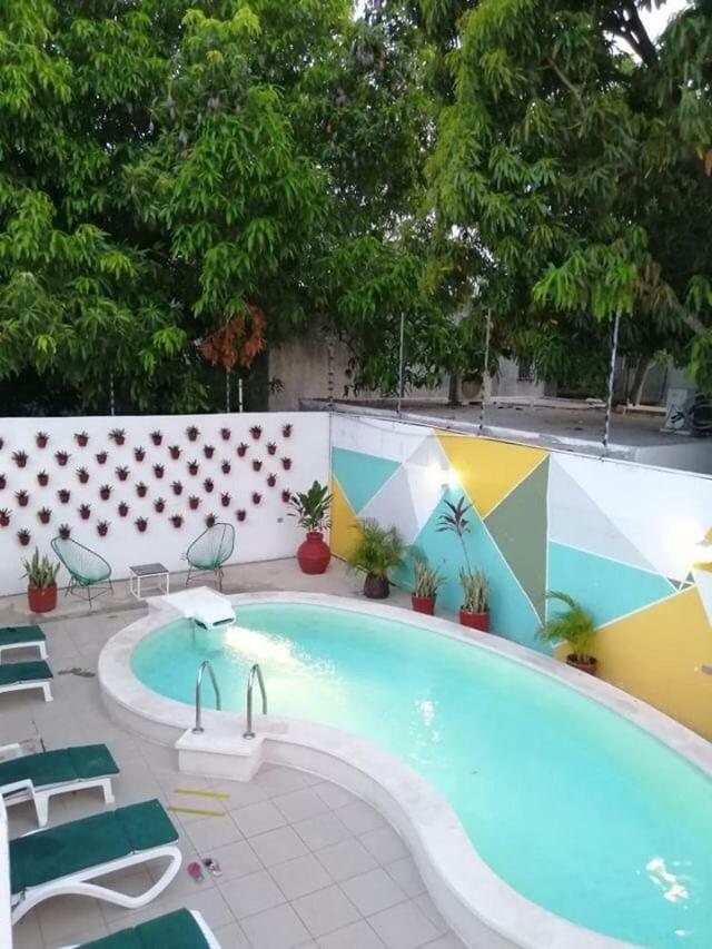 Moloch Hostel & Suites Cancún Exterior foto
